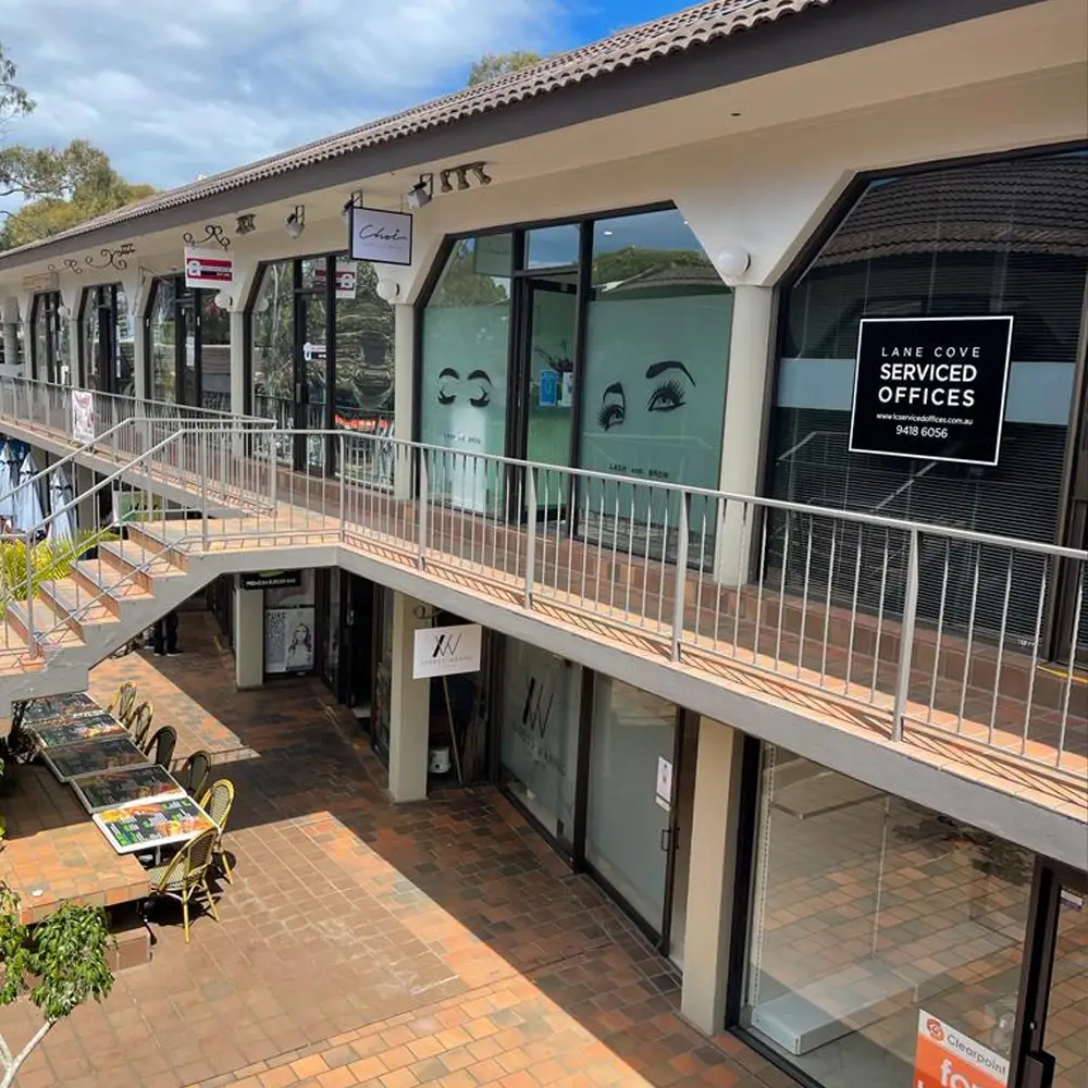 The arcade at 43–45 Burns Bay Road, Lane Cove, with the external stairs up to the Choi Lash and Brow walkway